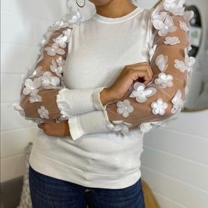 White sweater with Shear Appliqué Flower Sleeves